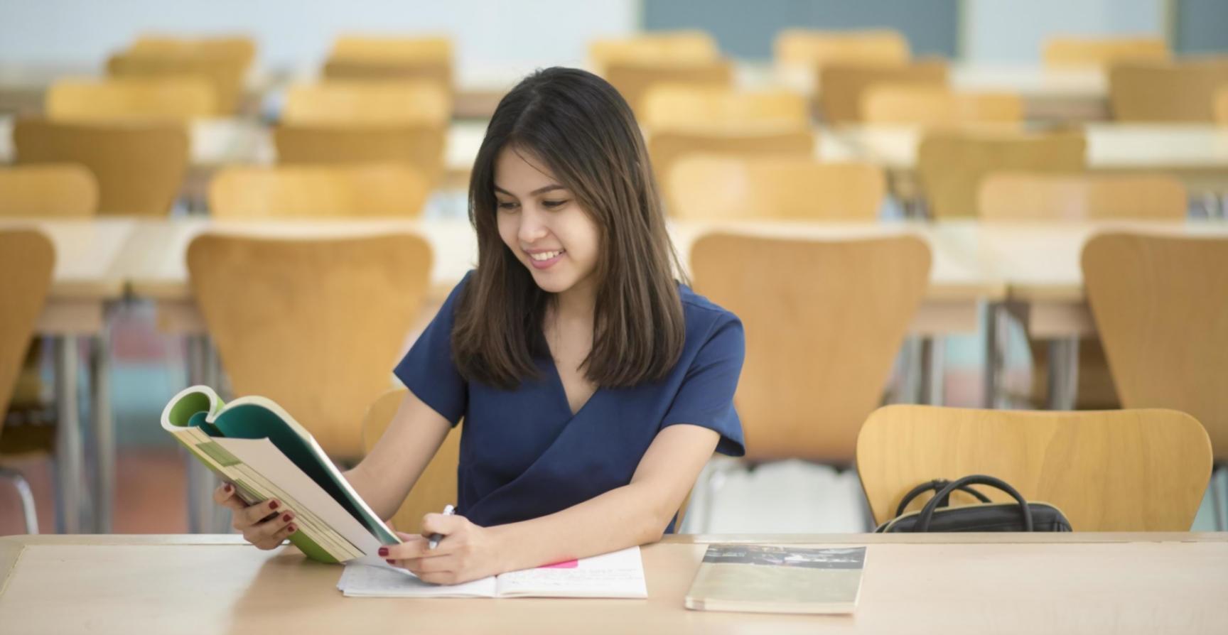 Professional team engaged in strategic planning session with financial documents and charts