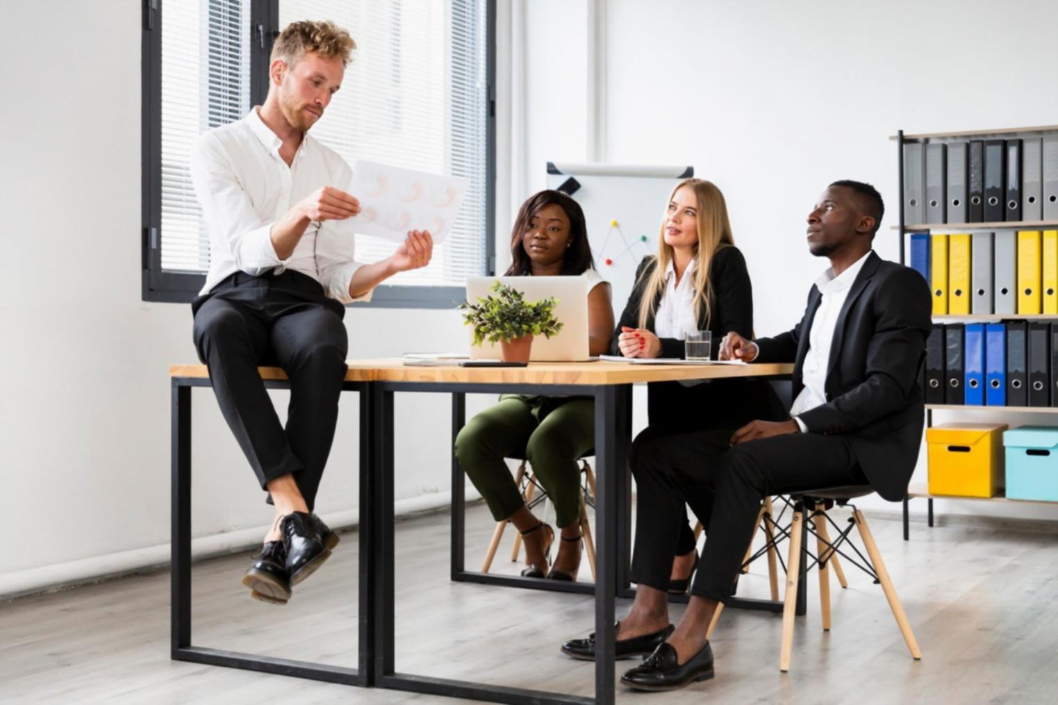 Modern conference room setup with presentation materials and collaborative workspace